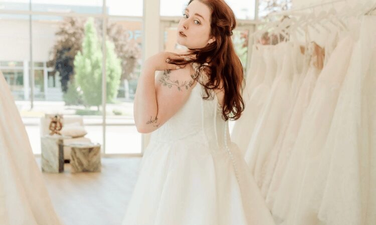 Bride trying on a wedding gown at Ivoire Bridal Atelier